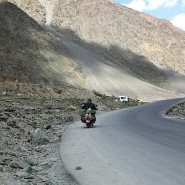 A biker driving in a canyon